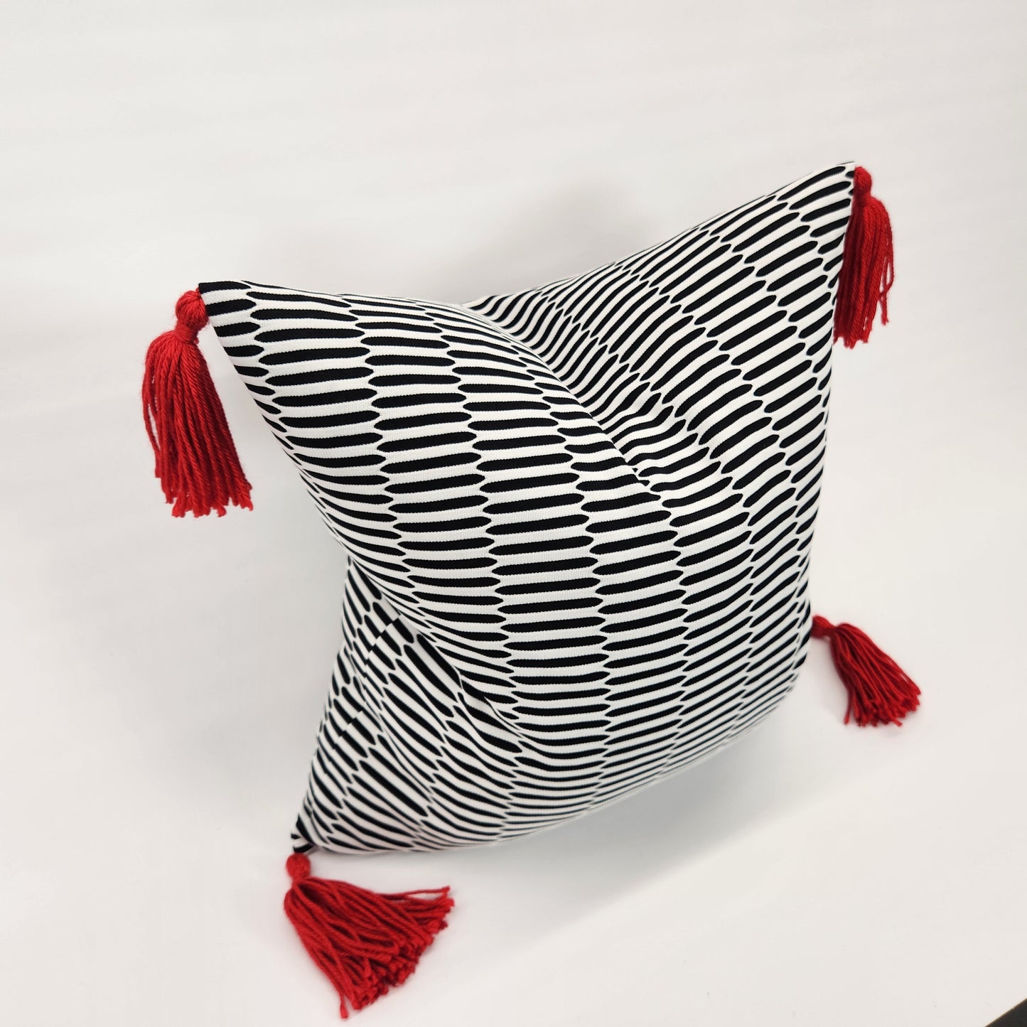 Vintage 1970s Black & White Double Knit Pillow with Red Tassels 20"